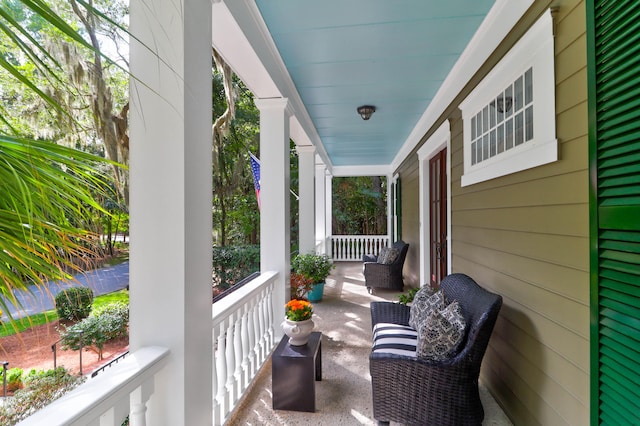 view of patio featuring a porch