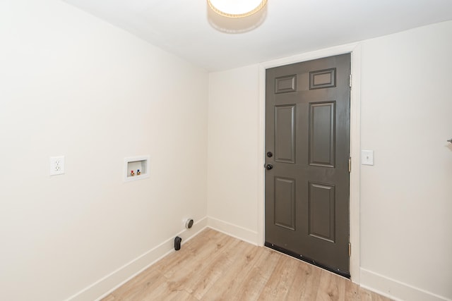 laundry area featuring light hardwood / wood-style floors and hookup for a washing machine