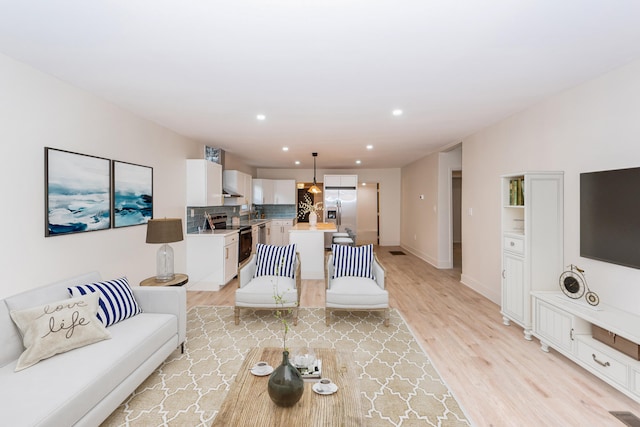 living room featuring light wood-type flooring