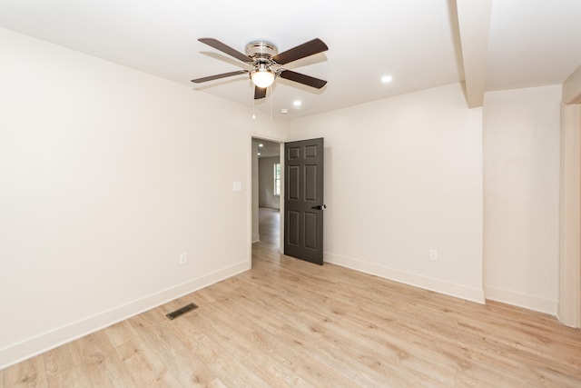 unfurnished room with light hardwood / wood-style flooring and ceiling fan