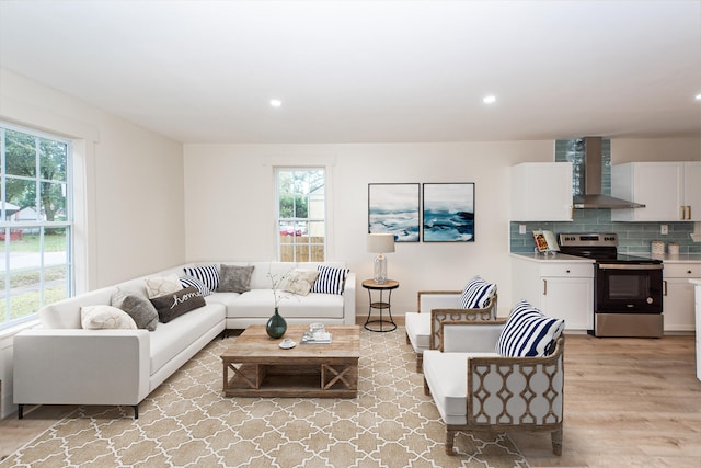 living room with light hardwood / wood-style floors