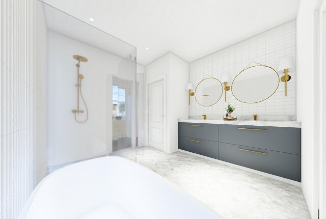 bathroom with a soaking tub, tile walls, and double vanity