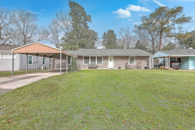 ranch-style home featuring driveway, a front lawn, and brick siding