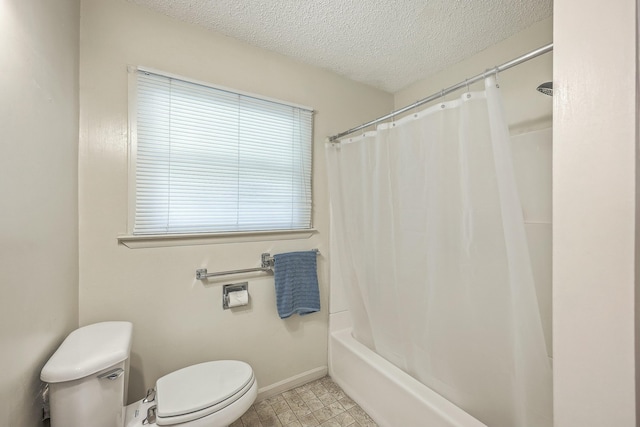 full bathroom featuring a textured ceiling, shower / bath combination with curtain, toilet, and baseboards