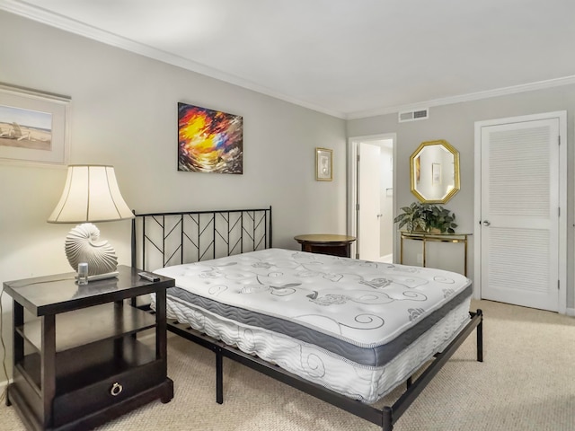 bedroom featuring crown molding and light carpet