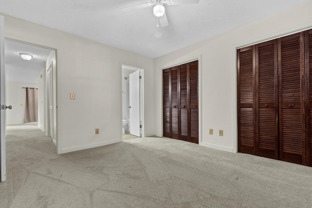 7950 Parklane Ct Unit C, North Charleston, SC 29418 - unfurnished bedroom with carpet flooring, two closets, ensuite bath, and a ceiling fan