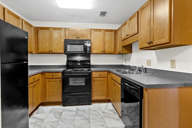 7950 Parklane Ct Unit C, North Charleston, SC 29418 - kitchen with black appliances, light marble finish flooring, dark countertops, a textured ceiling, and brown cabinetry