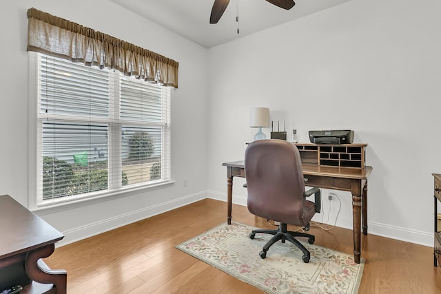 office area with hardwood / wood-style flooring and ceiling fan