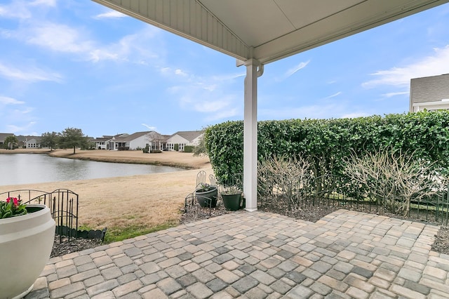 view of patio / terrace featuring a water view