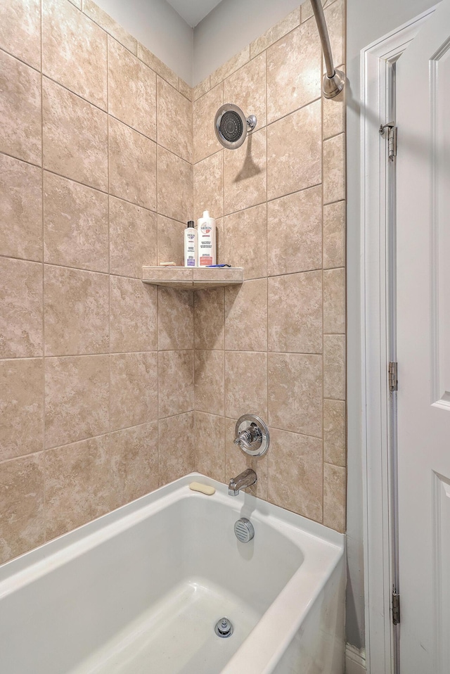 bathroom featuring  shower combination
