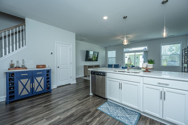 618 Ravensridge Ln, Moncks Corner, SC 29461 - kitchen featuring dishwasher, a sink, dark wood finished floors, open floor plan, and white cabinets