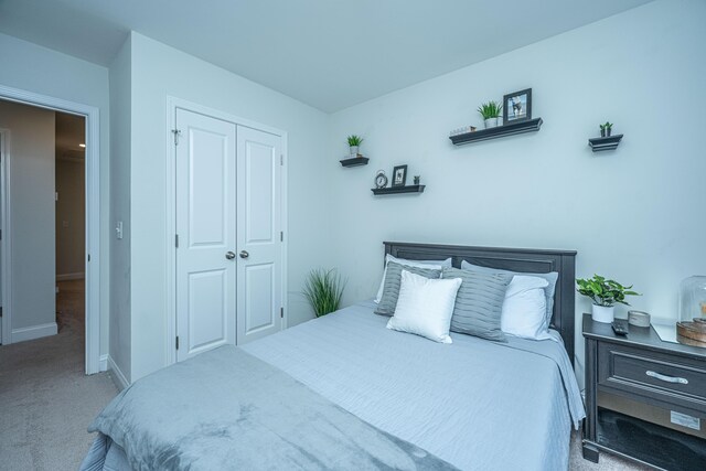 618 Ravensridge Ln, Moncks Corner, SC 29461 - bedroom featuring carpet floors, a closet, and baseboards