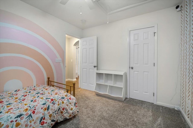 bedroom featuring ceiling fan and carpet floors