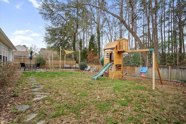 view of jungle gym featuring a yard