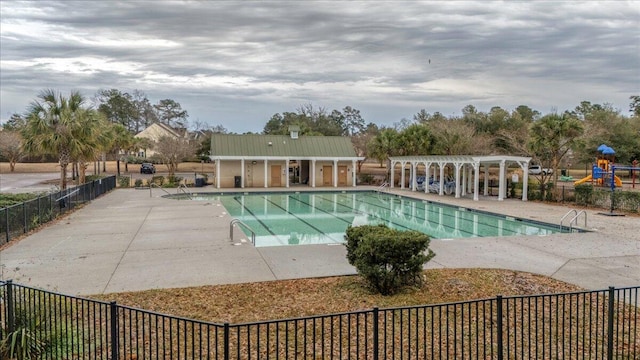 view of swimming pool with a pergola and a patio area