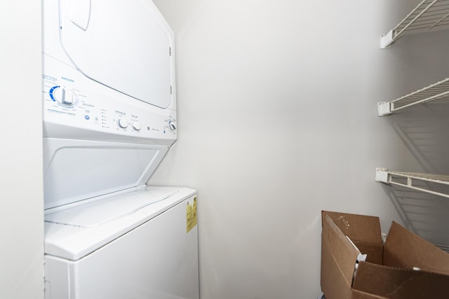 142 Marsh View Villas, Folly Beach, SC 29439 - clothes washing area featuring stacked washing machine and dryer