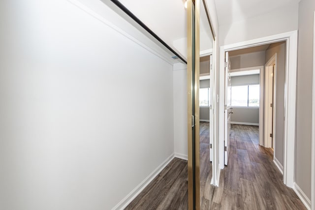 142 Marsh View Villas, Folly Beach, SC 29439 - corridor featuring dark wood-style flooring and baseboards