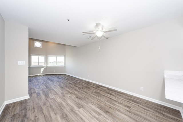 142 Marsh View Villas, Folly Beach, SC 29439 - empty room featuring ceiling fan, wood finished floors, and baseboards