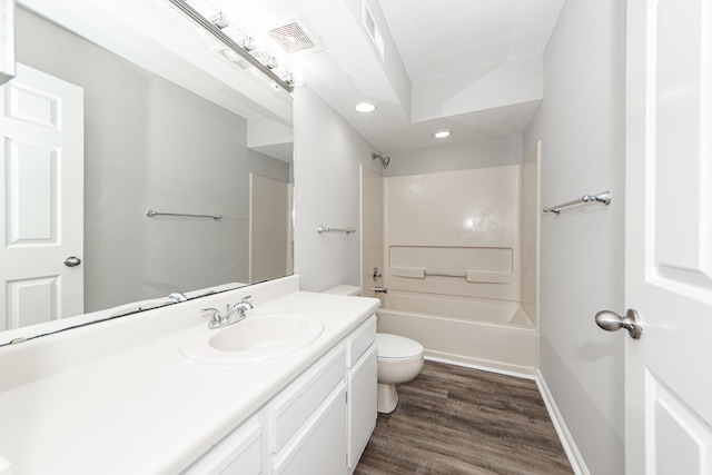 142 Marsh View Villas, Folly Beach, SC 29439 - full bath featuring toilet, recessed lighting, wood finished floors, vanity, and washtub / shower combination