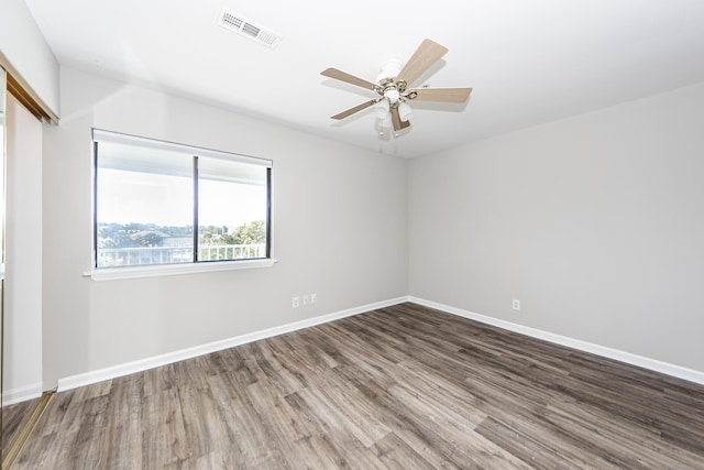 142 Marsh View Villas, Folly Beach, SC 29439 - unfurnished room featuring wood finished floors, baseboards, and a ceiling fan