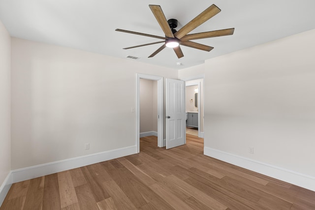 unfurnished bedroom with light hardwood / wood-style floors and ceiling fan