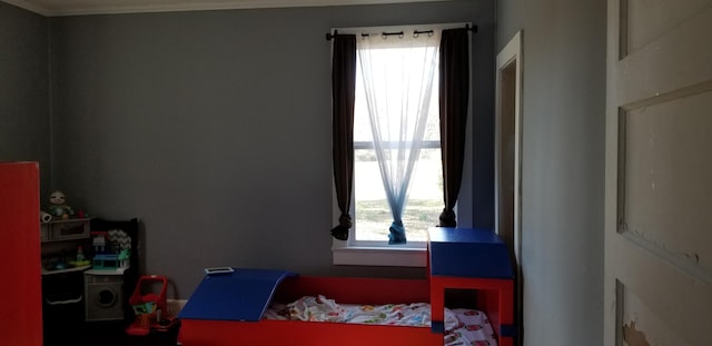 bedroom featuring ornamental molding