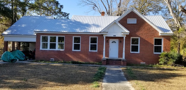 view of front facade featuring a carport