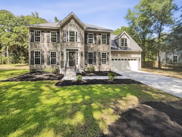 702 Spark St, Mount Pleasant, SC 29464 - colonial home with a front lawn, driveway, and a garage