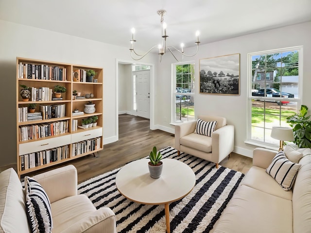 702 Spark St, Mount Pleasant, SC 29464 - living room with a chandelier and wood finished floors
