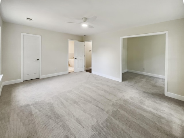 702 Spark St, Mount Pleasant, SC 29464 - unfurnished bedroom with carpet, a ceiling fan, and ensuite bath