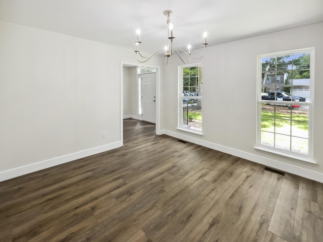 702 Spark St, Mount Pleasant, SC 29464 - unfurnished dining area with a chandelier and dark wood-style floors