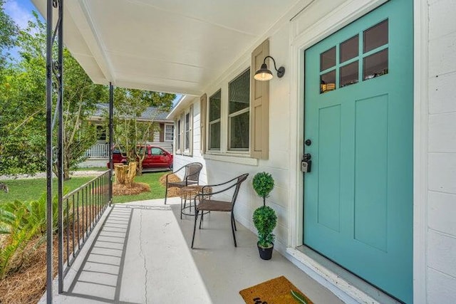 property entrance with a porch