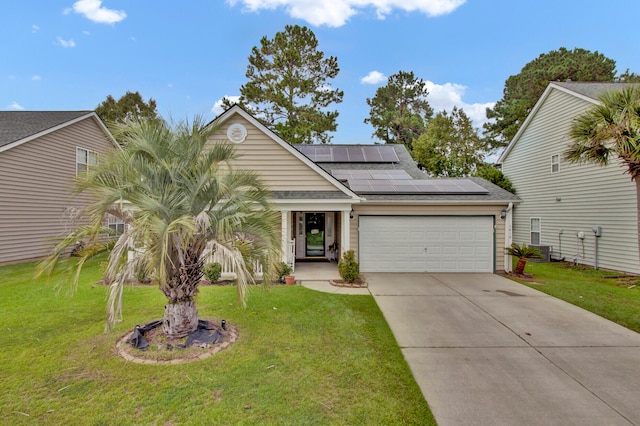 view of front of house featuring a garage, solar panels, and a front lawn