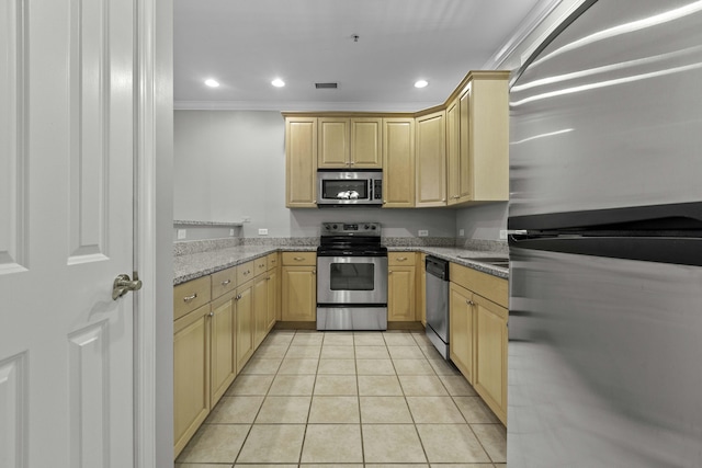 kitchen with light brown cabinetry, visible vents, ornamental molding, light tile patterned floors, and appliances with stainless steel finishes