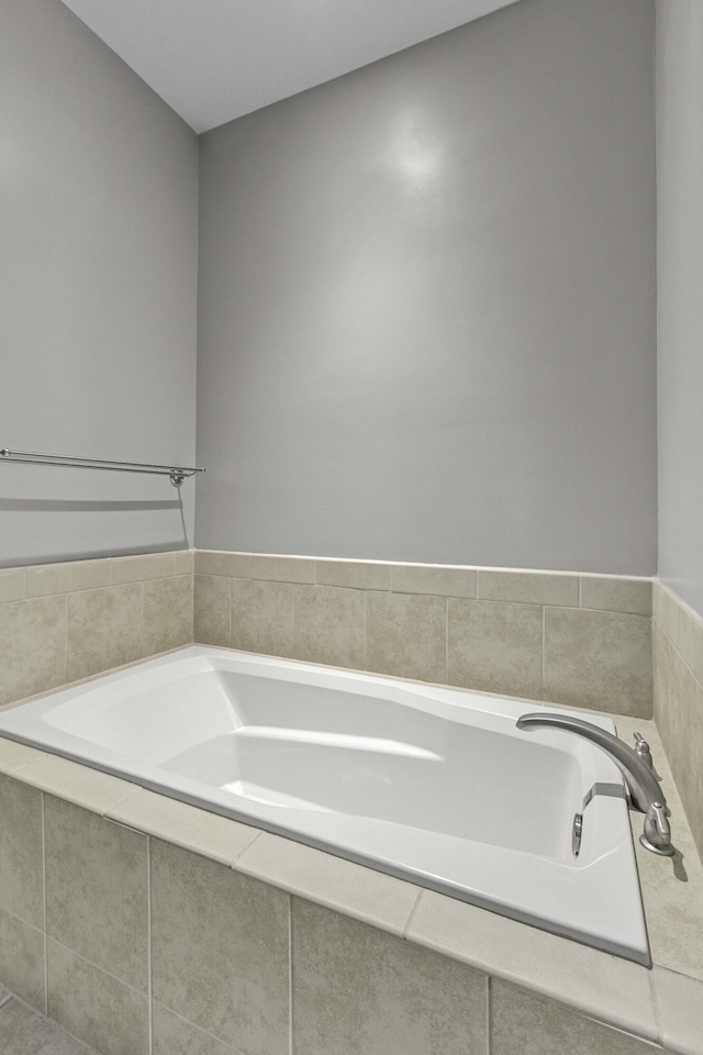full bathroom with a bath
