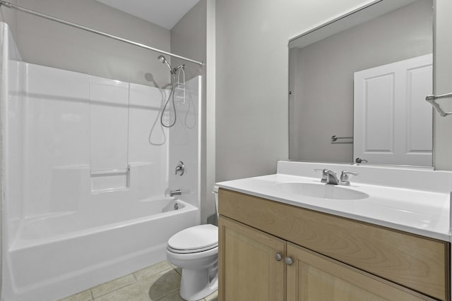 bathroom with toilet, shower / bathtub combination, vanity, and tile patterned floors