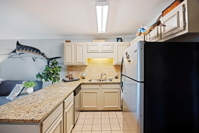 kitchen featuring refrigerator, sink, crown molding, stainless steel dishwasher, and tasteful backsplash