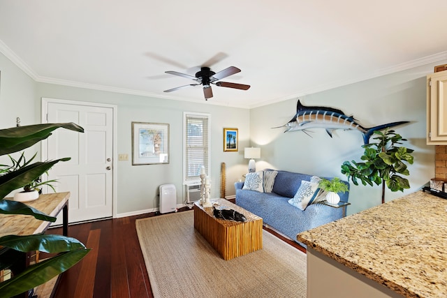 living room with dark hardwood / wood-style flooring, ceiling fan, and crown molding