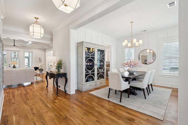 3858 Sawyers Island Dr, Mount Pleasant, SC 29466 - dining room with a decorative wall, a wealth of natural light, wood finished floors, and visible vents