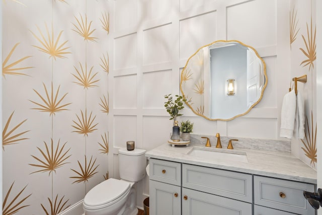 3858 Sawyers Island Dr, Mount Pleasant, SC 29466 - bathroom with toilet, a decorative wall, and vanity