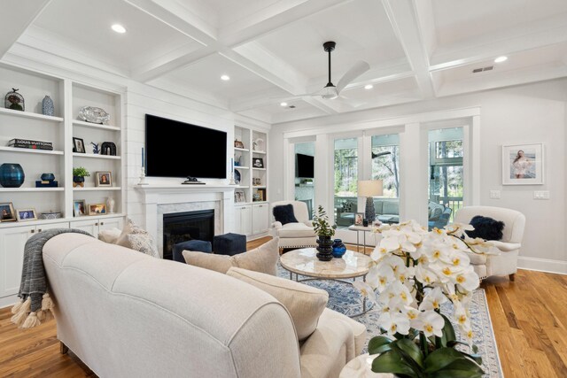 3858 Sawyers Island Dr, Mount Pleasant, SC 29466 - living room with a fireplace, wood finished floors, a ceiling fan, beam ceiling, and coffered ceiling