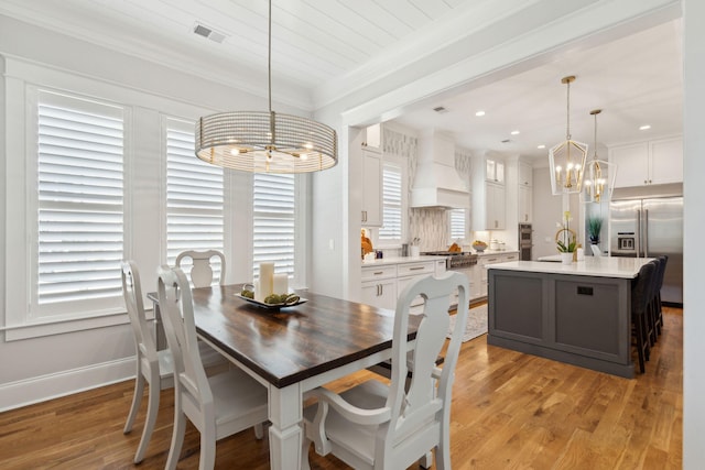 3858 Sawyers Island Dr, Mount Pleasant, SC 29466 - dining area with visible vents, light wood-style floors, and a chandelier