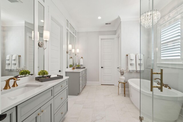 3858 Sawyers Island Dr, Mount Pleasant, SC 29466 - bathroom featuring a sink, two vanities, marble finish floor, visible vents, and a freestanding bath
