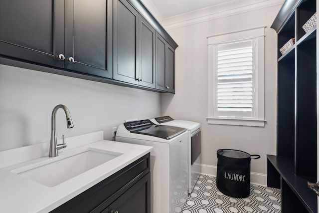 3858 Sawyers Island Dr, Mount Pleasant, SC 29466 - clothes washing area with ornamental molding, baseboards, a sink, cabinet space, and washer and dryer