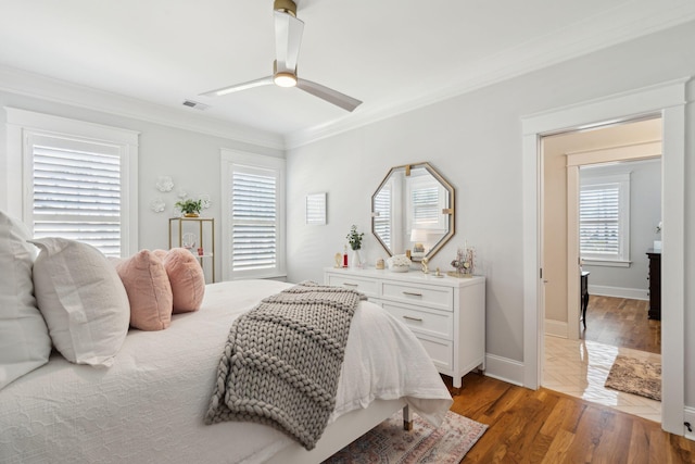 3858 Sawyers Island Dr, Mount Pleasant, SC 29466 - bedroom featuring a ceiling fan, wood finished floors, baseboards, visible vents, and ornamental molding