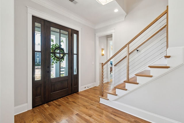 3858 Sawyers Island Dr, Mount Pleasant, SC 29466 - entrance foyer featuring ornamental molding, baseboards, stairway, and wood finished floors