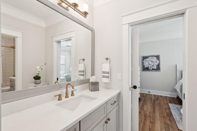 3858 Sawyers Island Dr, Mount Pleasant, SC 29466 - ensuite bathroom with crown molding, baseboards, connected bathroom, wood finished floors, and vanity