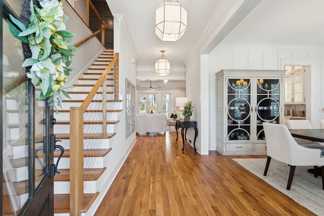 3858 Sawyers Island Dr, Mount Pleasant, SC 29466 - foyer entrance with french doors, ornamental molding, light wood-style floors, and stairs