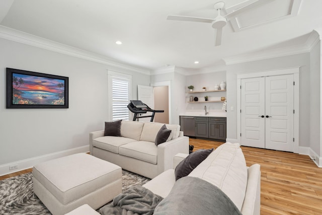 3858 Sawyers Island Dr, Mount Pleasant, SC 29466 - living room featuring recessed lighting, wet bar, ornamental molding, baseboards, and light wood-style flooring