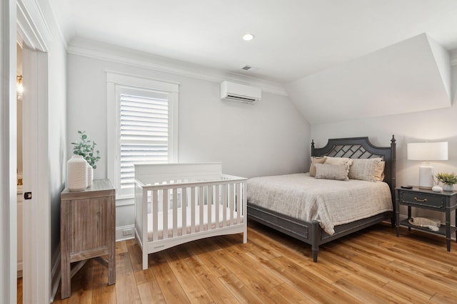3858 Sawyers Island Dr, Mount Pleasant, SC 29466 - bedroom with lofted ceiling, light wood-style flooring, an AC wall unit, and ornamental molding
